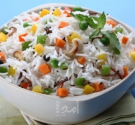 لعشاق الرجيم والأكلات النباتية.. إليكم طريقة عمل أرز بالخضار؟!