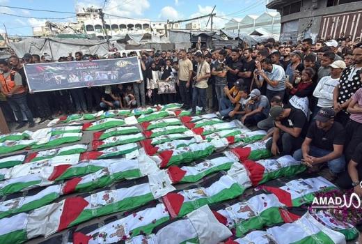 تشييع جثامين 51 شهيدا انتشلتهم طواقم الإنقاذ من تحت أنقاض النصيرات وسط قطاع غزة